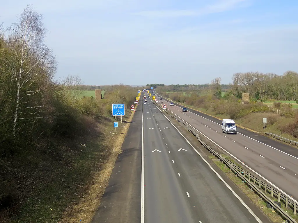Two second rule, showing chevrons on the M11 Motorway at approximately 2 second spaces when driving at national speed limit.
